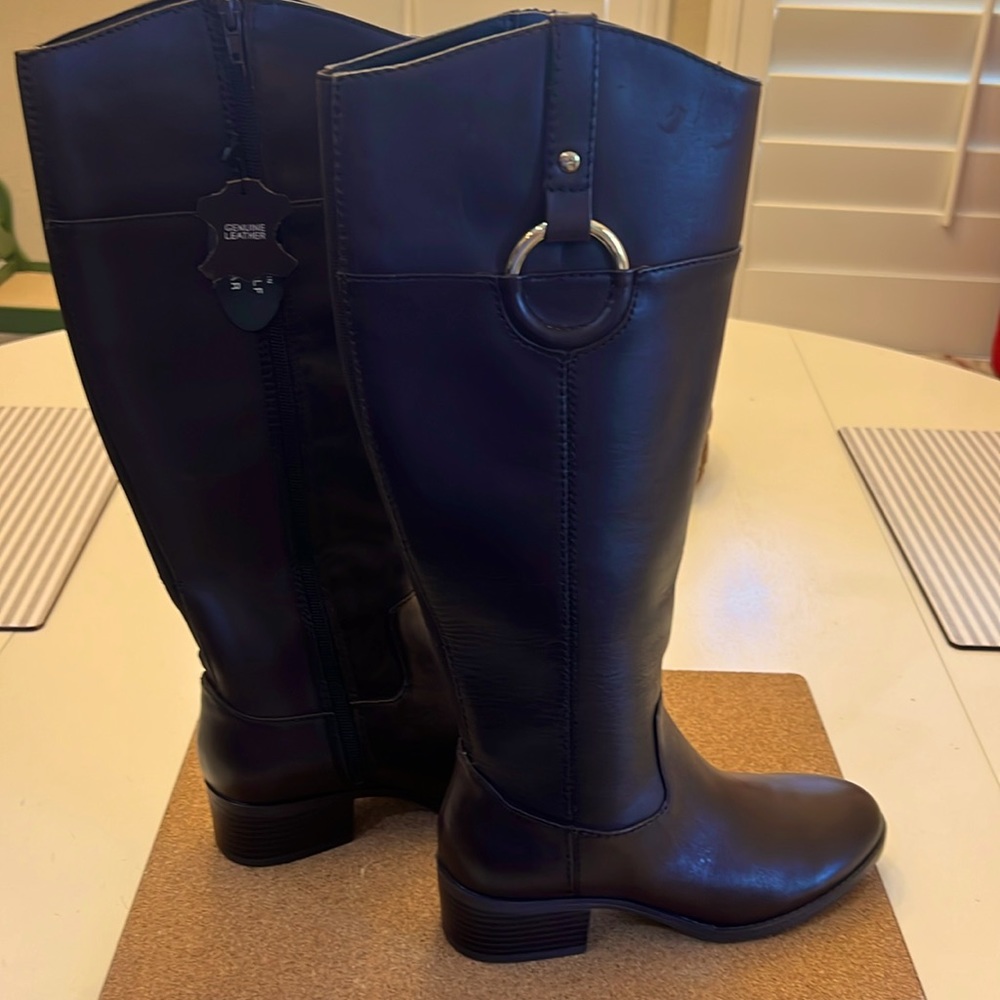 New Alfani riding boots with gold ring detail.